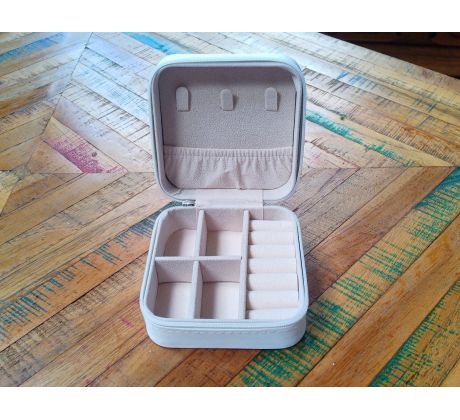 Praktická cestovní bílá šperkovnice s variabilními přihrádkami na zip